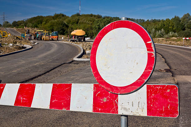 Closed highway Warning sign in new highway under construction flattening stock pictures, royalty-free photos & images