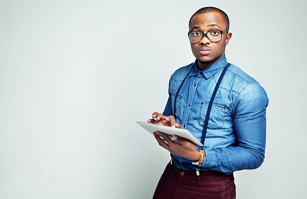 istock Look good fashion man with tablet 465524069