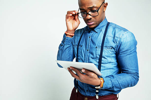 istock Look good fashion man with tablet 465524077
