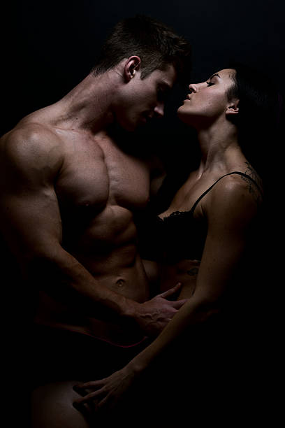 istock Attractive couple embracing and romancing 465524770