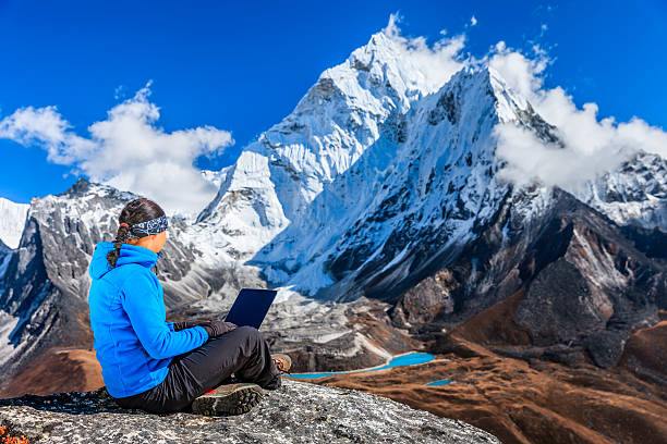 Photo of Woman is using laptop in Mount Everest National Park, Nepal