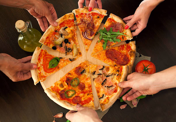 istock Pizza- food with friends 465525034