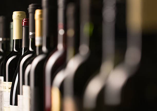 istock Row of vintage wine bottles 465525794