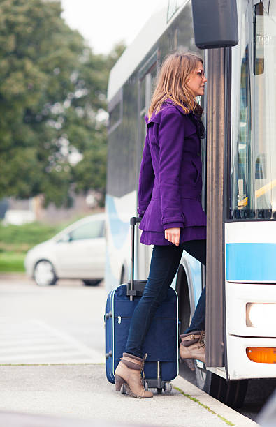 istock Young traveler boarding a bus 465528467