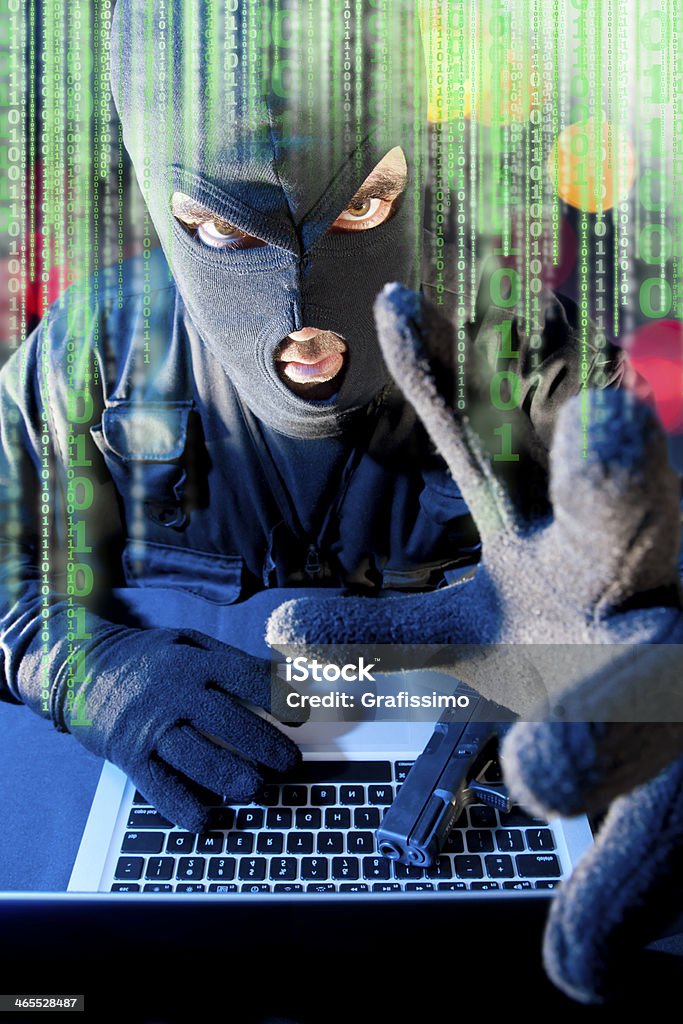 A cibercriminalidade Ladrão Roubar dados de computador portátil - Royalty-free Adulto Foto de stock
