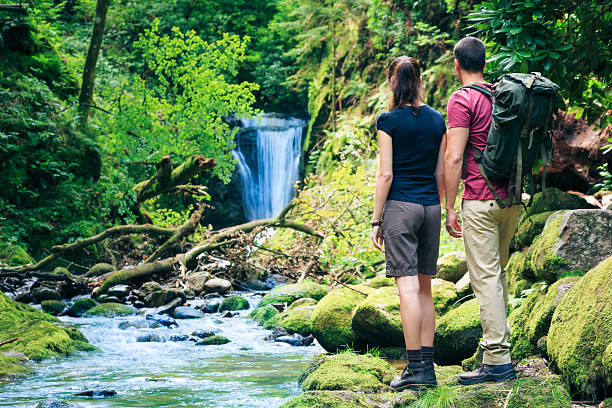 istock young couple hiking 465529801