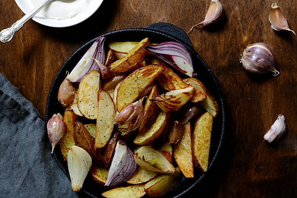istock Baked potatoes with onion and garlic 465530348