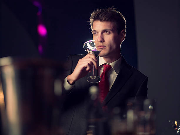 istock young man in a night club 465530689