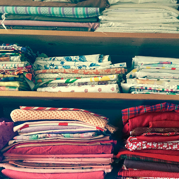 istock Fabrics in shelfes of textile workshop 465531788