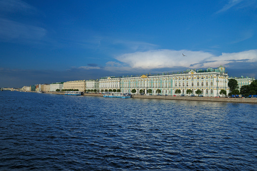 View to the Winter Palace and embankment of Neva river in St. Petersburg, Russia