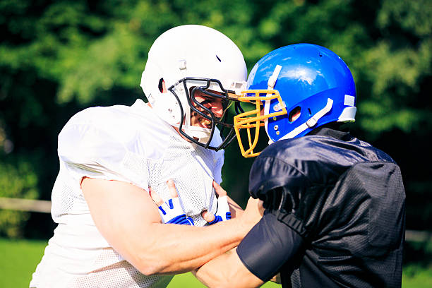 istock american football players facing each other 465537189