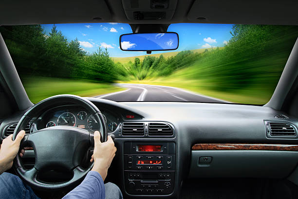 istock Driving with driver behind the steering wheel - speed concept 465537461