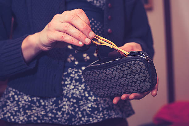 istock Woman holding her sunglasses 465539847