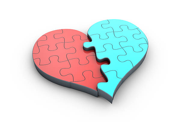 dos piezas del corazón. - portion blue jigsaw puzzle puzzle fotografías e imágenes de stock