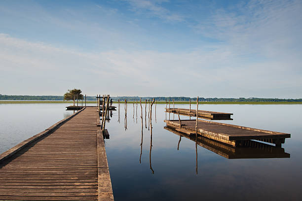 Wooden pier on Soustons lake, France stock photo