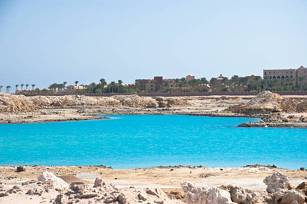 istock Amazing Blue lake among the sand and rocks 465544805