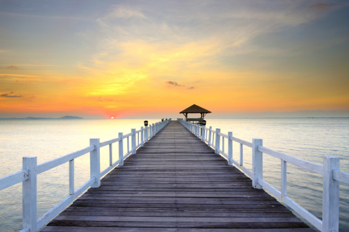wood bridge it's a  Way to  the sea  in chonburi of thailand  and it's a beautifull  landscape of a  sunrise