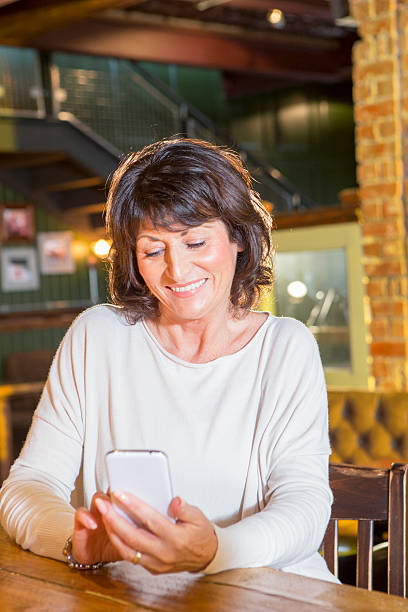 istock Senior Woman Using a Mobile Phone 465545322