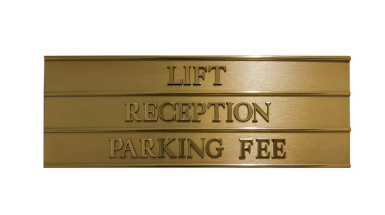 Direction signs lift, reception and parking fee