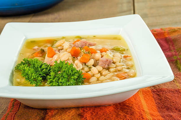 istock Ham and bean soup with carrots 465552856