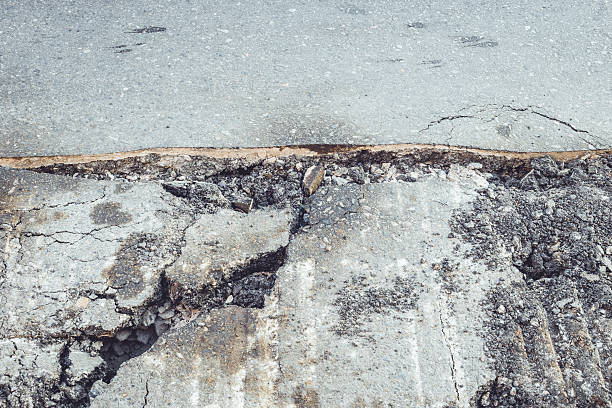 istock Asphalt road repair 465552938