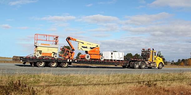 istock Semi-truck with a load of equipment 465553287