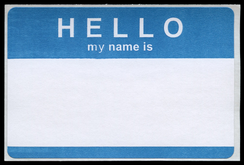 blue hello sticker isolated against black