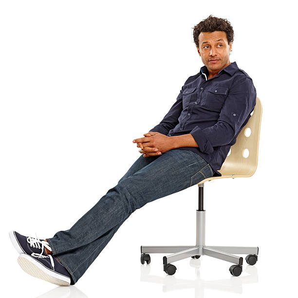 Moving office: Businessman in empty room with copyspace