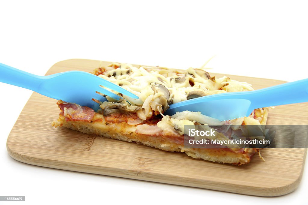 Pedaço de pizza com talheres de prata - Foto de stock de Assado no Forno royalty-free