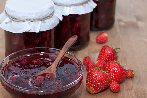 istock Strawberry jam in a glass jar. 465560769