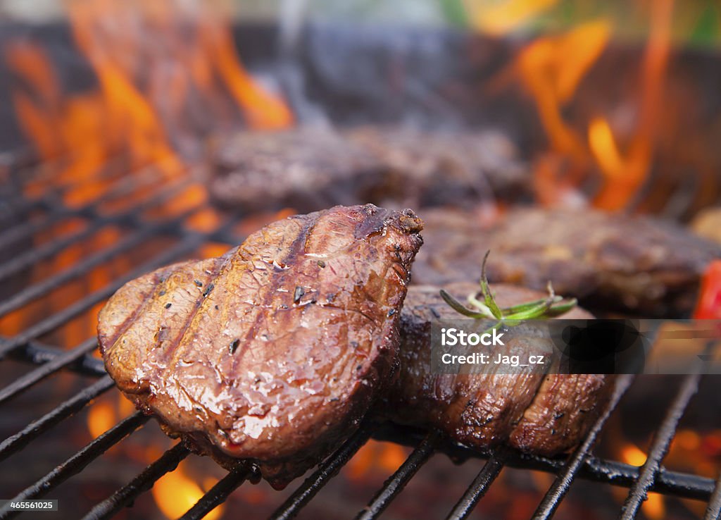 Beef steaks Delicious beef steaks on grill Barbecue - Meal Stock Photo