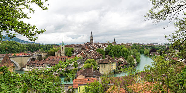 istock Church, bridge and houses with tiled rooftops, Bern 465566157