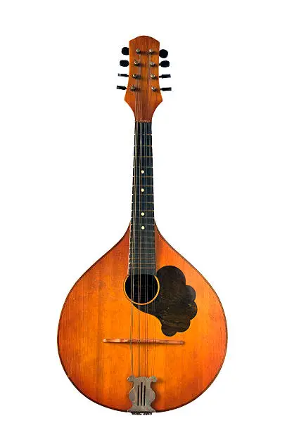 Old musical instrument - mandolin isolated on white background