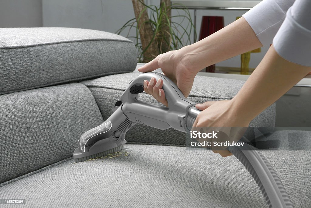 cleaning sofa vacuum cleaner house Sofa Stock Photo