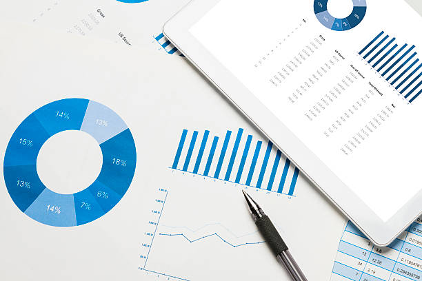 istock Financial reports on a tablet and on paper 465580281