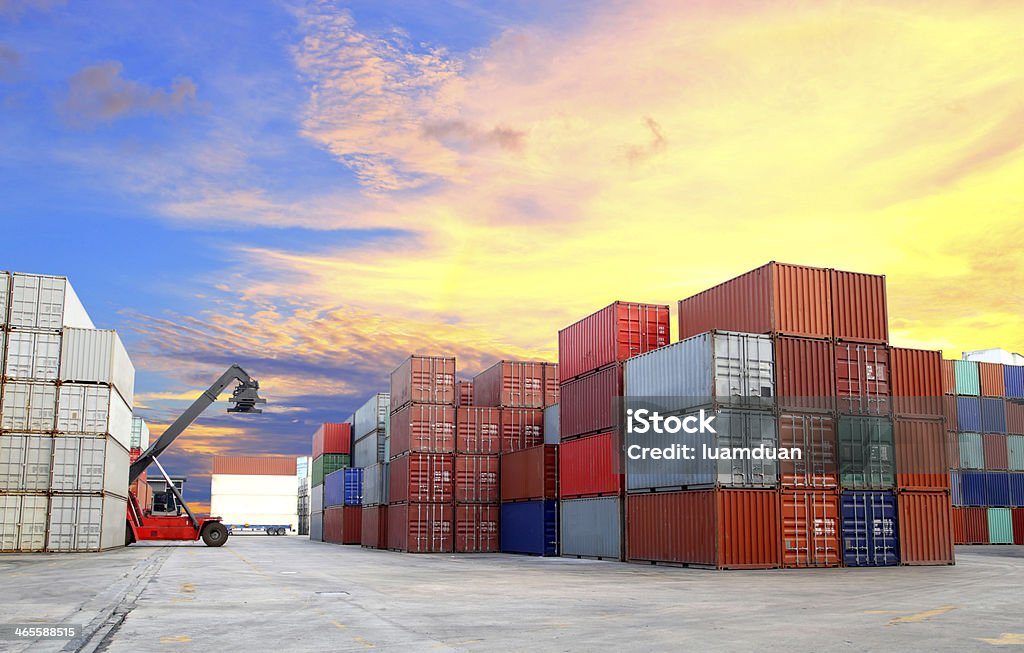 forklift at dockyard with beautiful sky Container Stock Photo