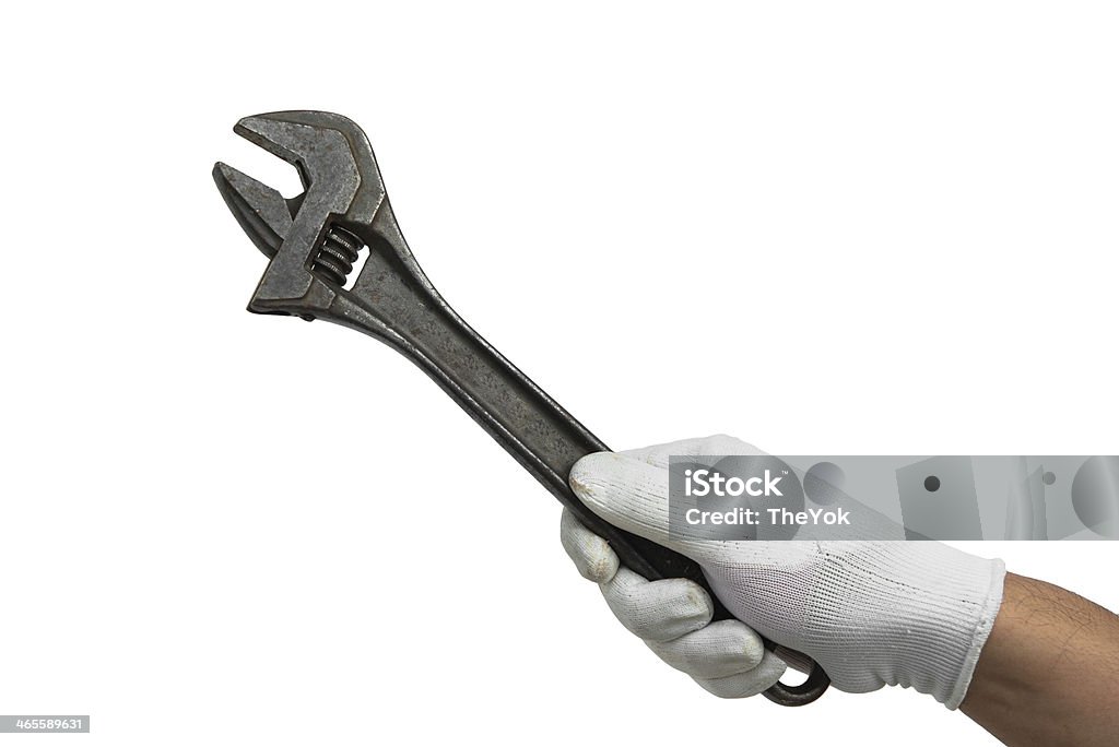 adjustable wrench in hand composition isolated on white Adjustable Wrench Stock Photo