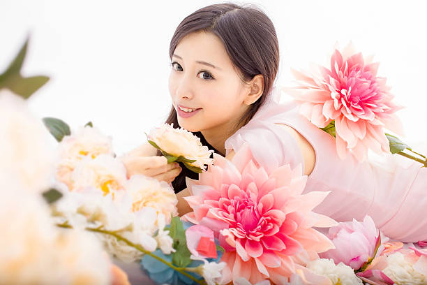 istock girl in flowers sleeping spa 465593970
