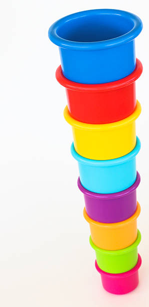 upside down-cup tower - cup child geometric shape stacking stock-fotos und bilder