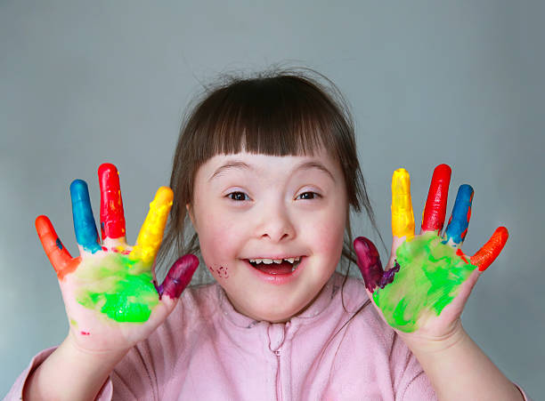 istock Cute little girl with painted hands 465600994
