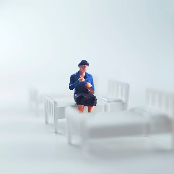 istock Woman Sitting on Bed 465601804