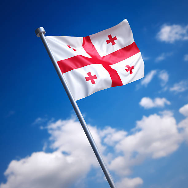 istock Flag of Georgia against blue sky 465602019