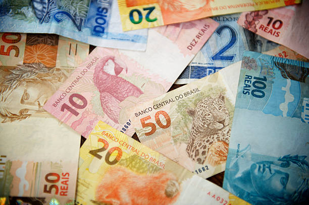 istock Pile of Brazilian Reals Currency Notes Different Denominations 465607497