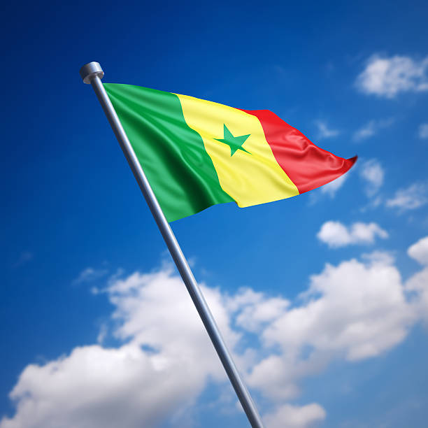 istock Flag of Senegal against blue sky 465608051