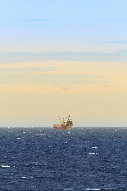 istock Tender Drilling Oil Rig In The Ocean 465608451