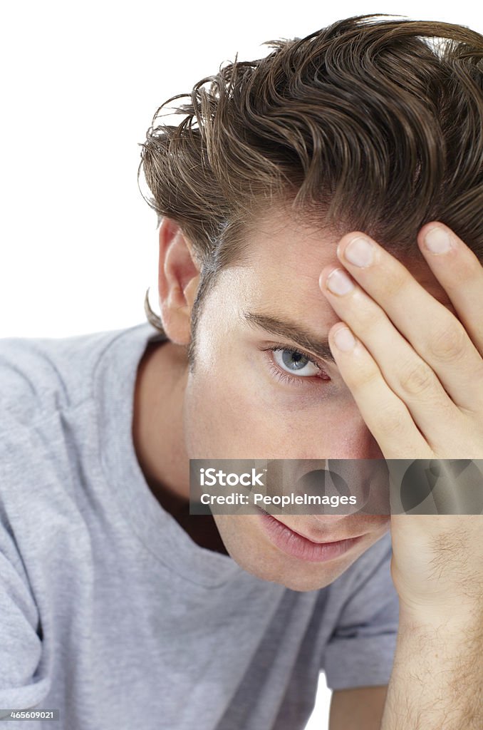 Feeling like a failure Disheartened young man looking at the camera with his hand on his forehead 20-24 Years Stock Photo