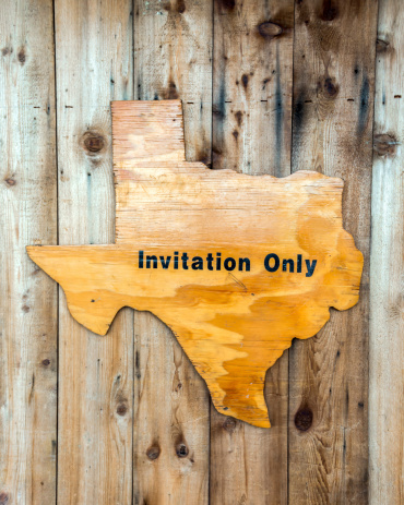 The outline of Texas with Invitation Only on it.