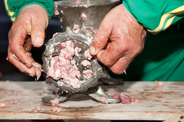 istock Mincer and a pile of chopped meat 465611268