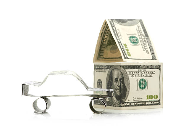 istock Car and house made of Dollars 465611374