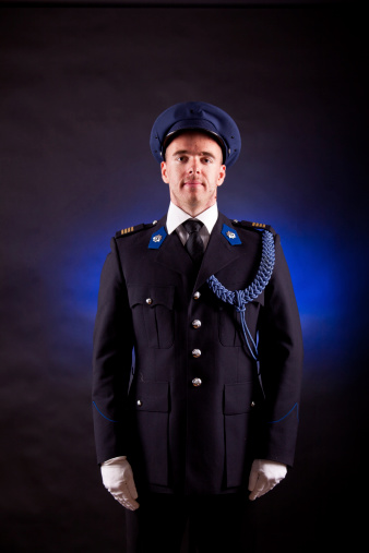 elegant soldier wearing uniform in studio